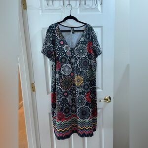 Blue flowered dress bought in Quebec, Canada.  Never worn.